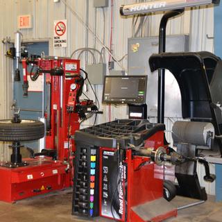 Wheel servicing equipment